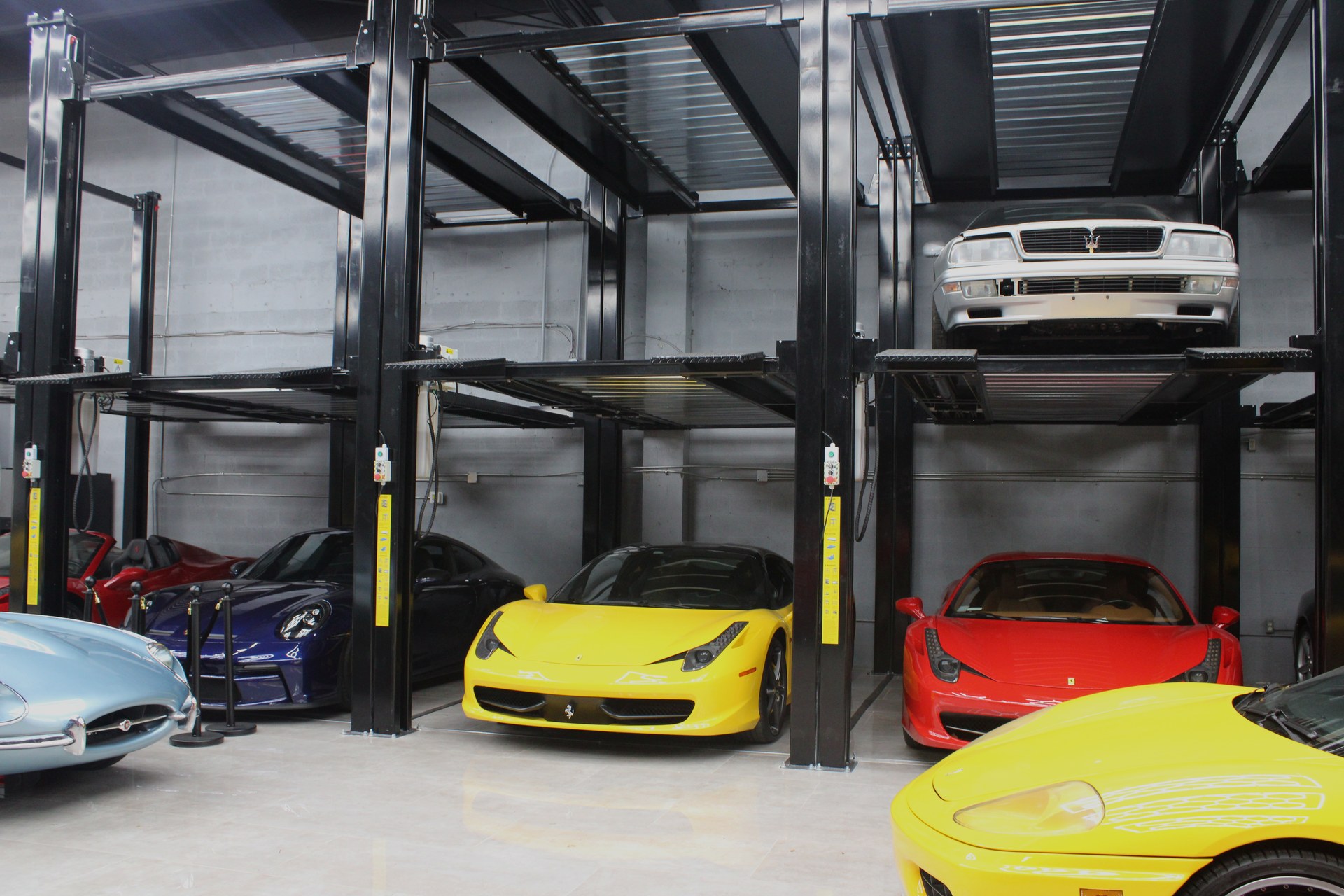 Fiorano facility — cars resting under hex lights