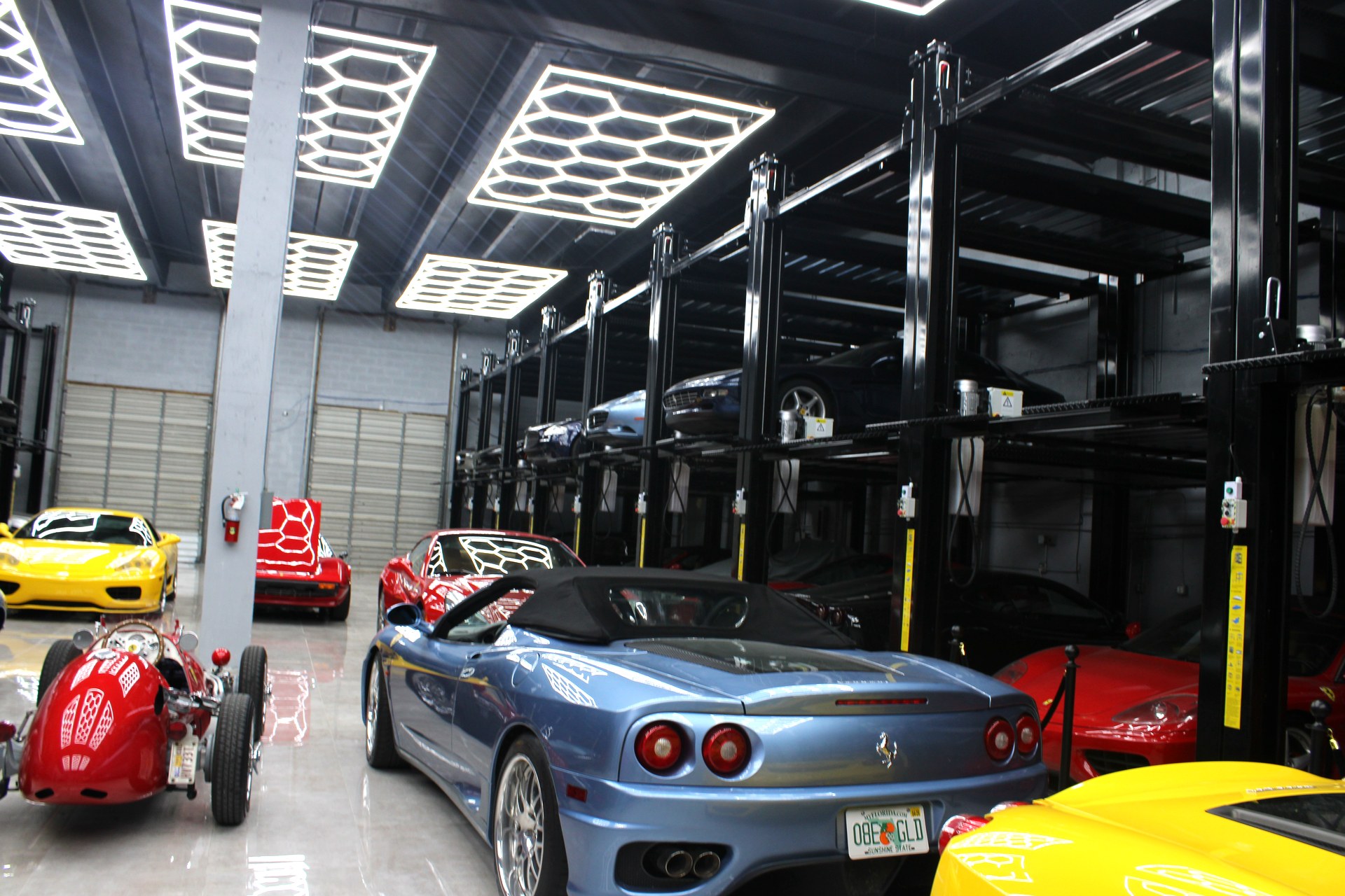 Inside Fiorano — multi-tier lifts under hexagonal LED lighting